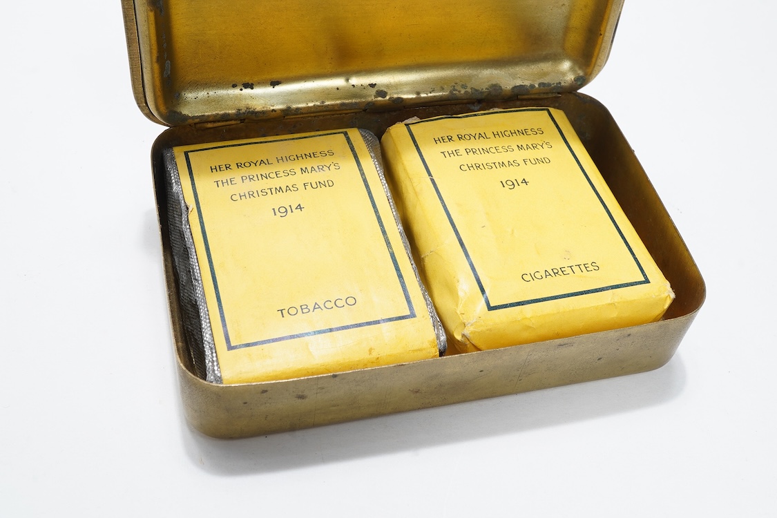 A 1914 Princess Mary Christmas tin containing the original sealed packet of tobacco, the packet of cigarettes and the Christmas card